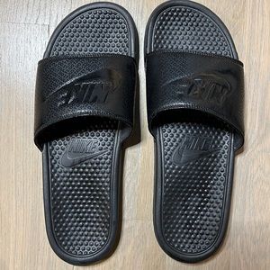 Black Nike slides sandals